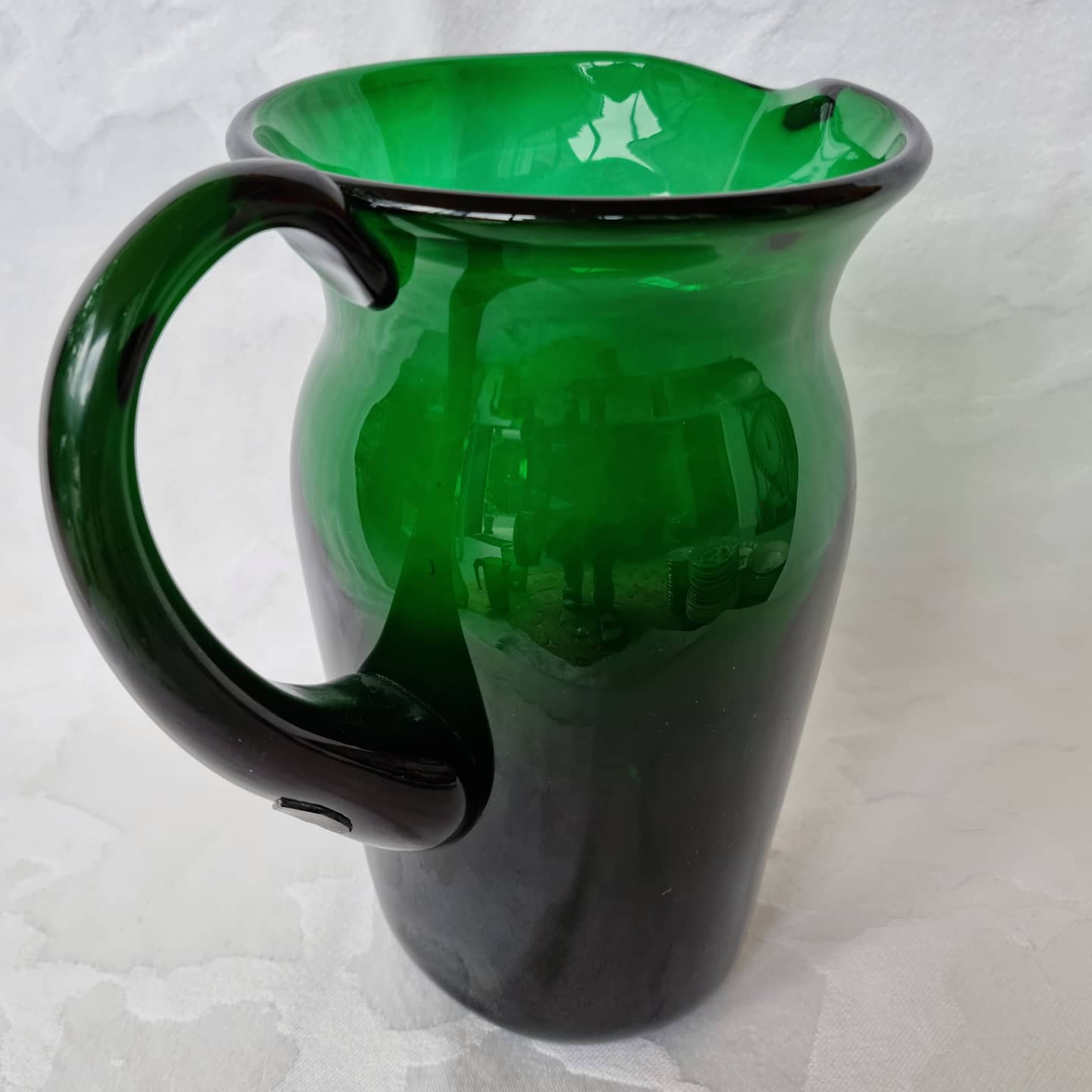 Green glass pitcher