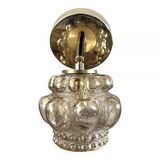 Gold tilting wall light