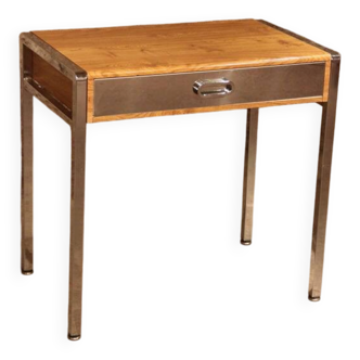 Small dressing table with chrome legs and oak laminate.