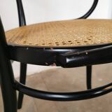 Curved wood and cane armchair called "Le Corbusier"