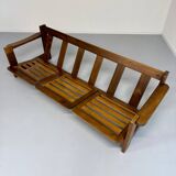Old 3-seater sofa in solid wood, Maison Regain design, from the 70s.