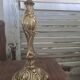 Vintage table lamp with a bronze base and moulded glass globe.