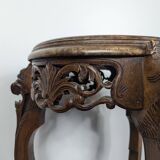 Carved selette with chimera decoration