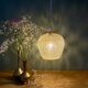 Suspension globe vintage en verre moulé ambré