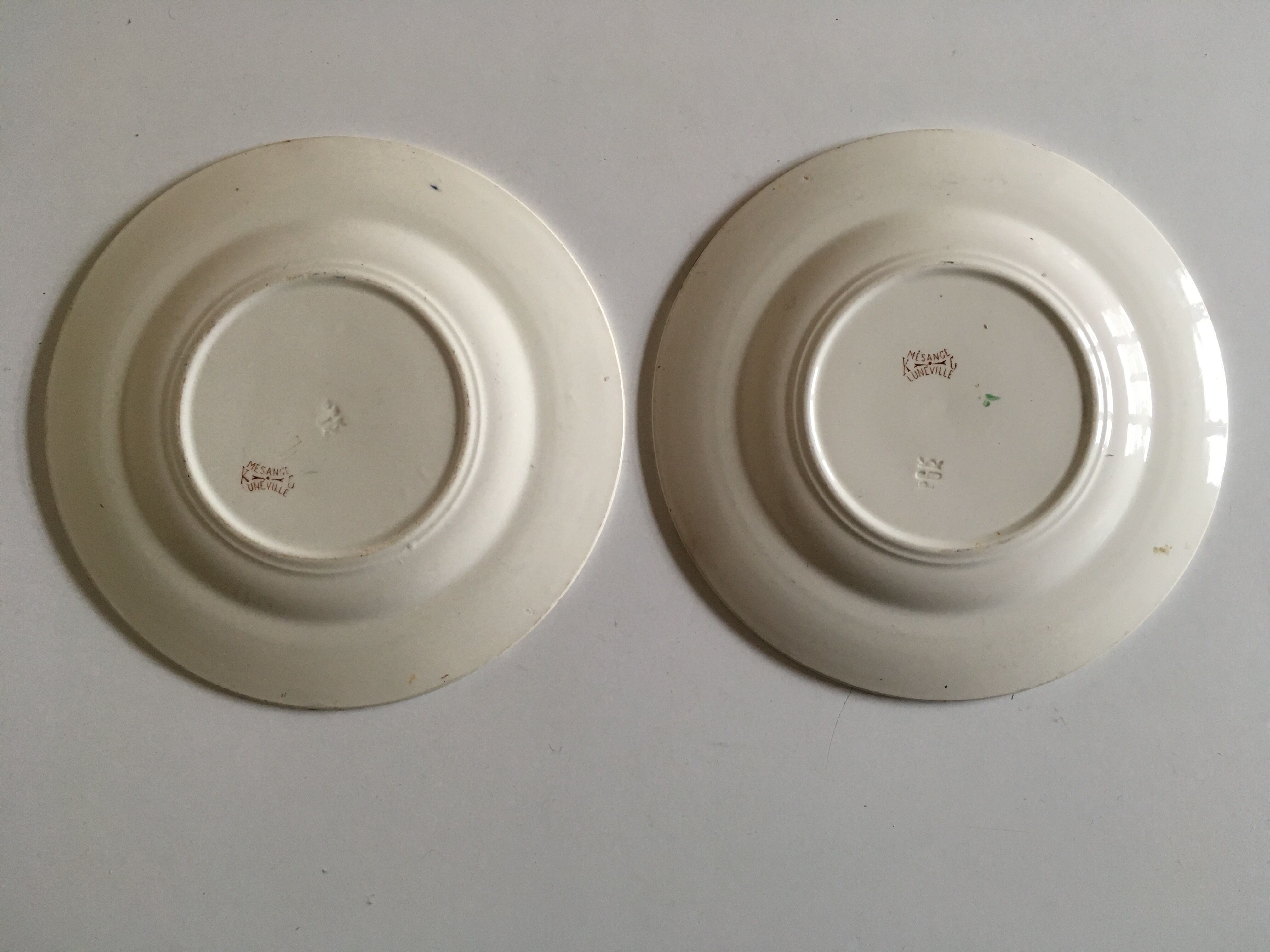 Pair of bird plates in iron earth Lunéville chickadee