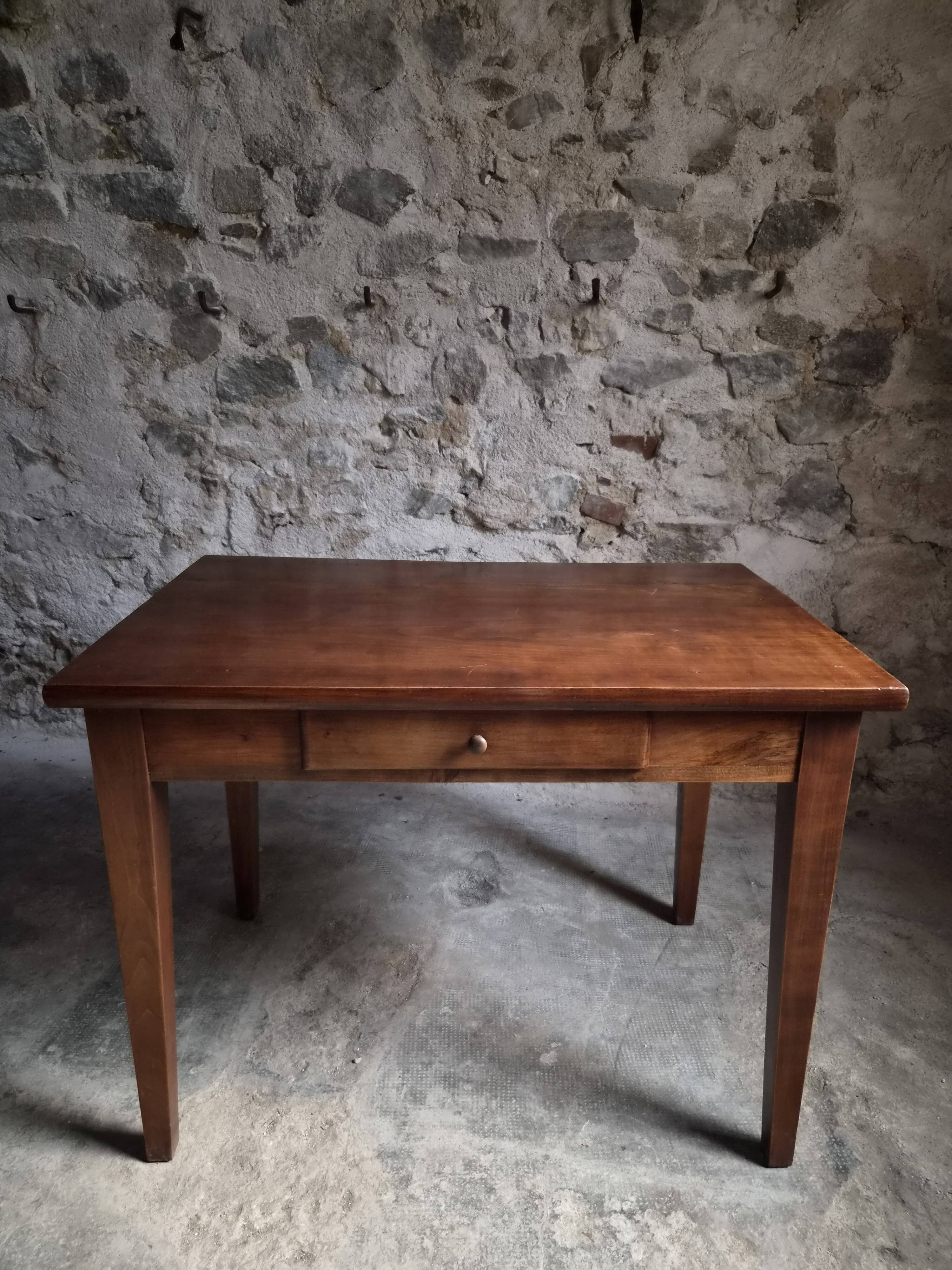 Old French table in cherry wood with bistro chair, circa 1900–1930.