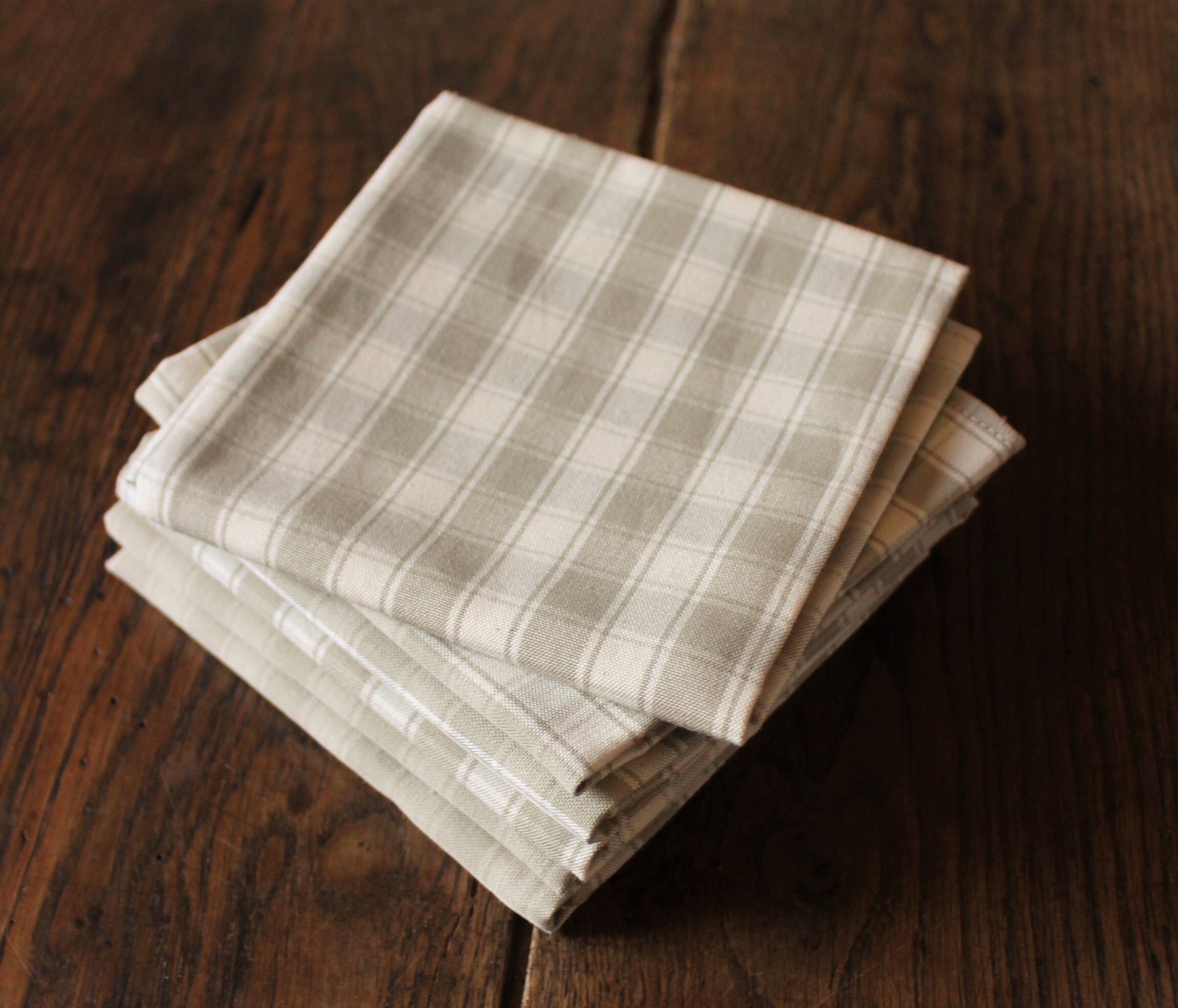Lot 6 gingham cotton napkins and beige linen tiles
