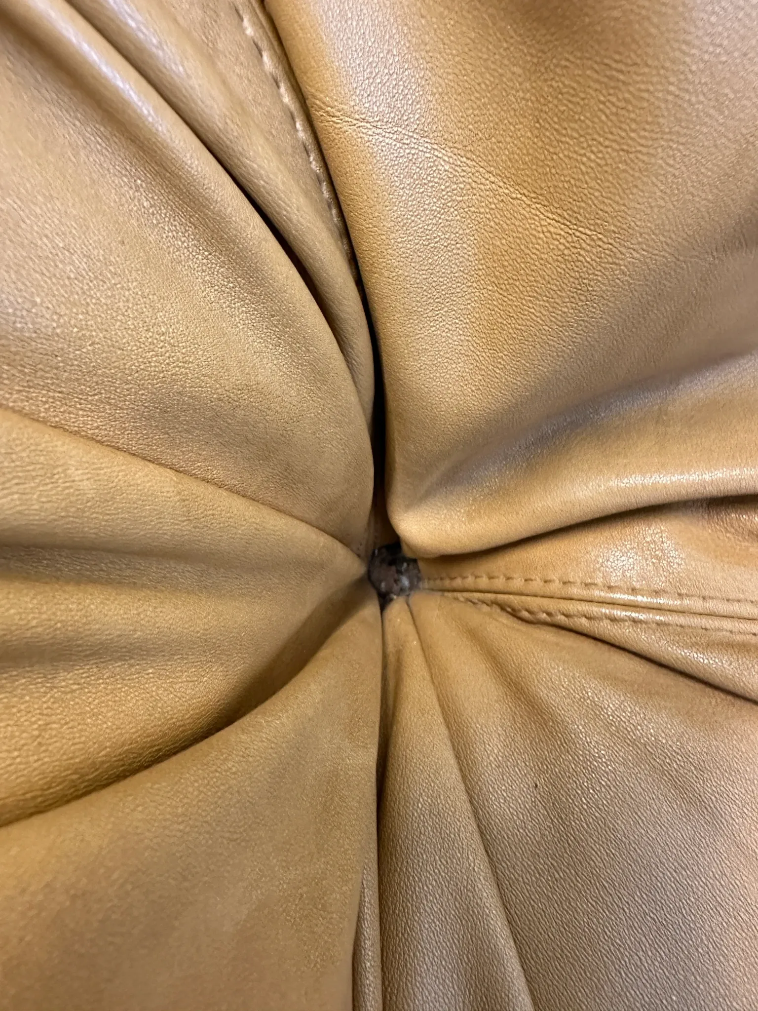 Pair of brutalist leather lounge chairs, 1960s