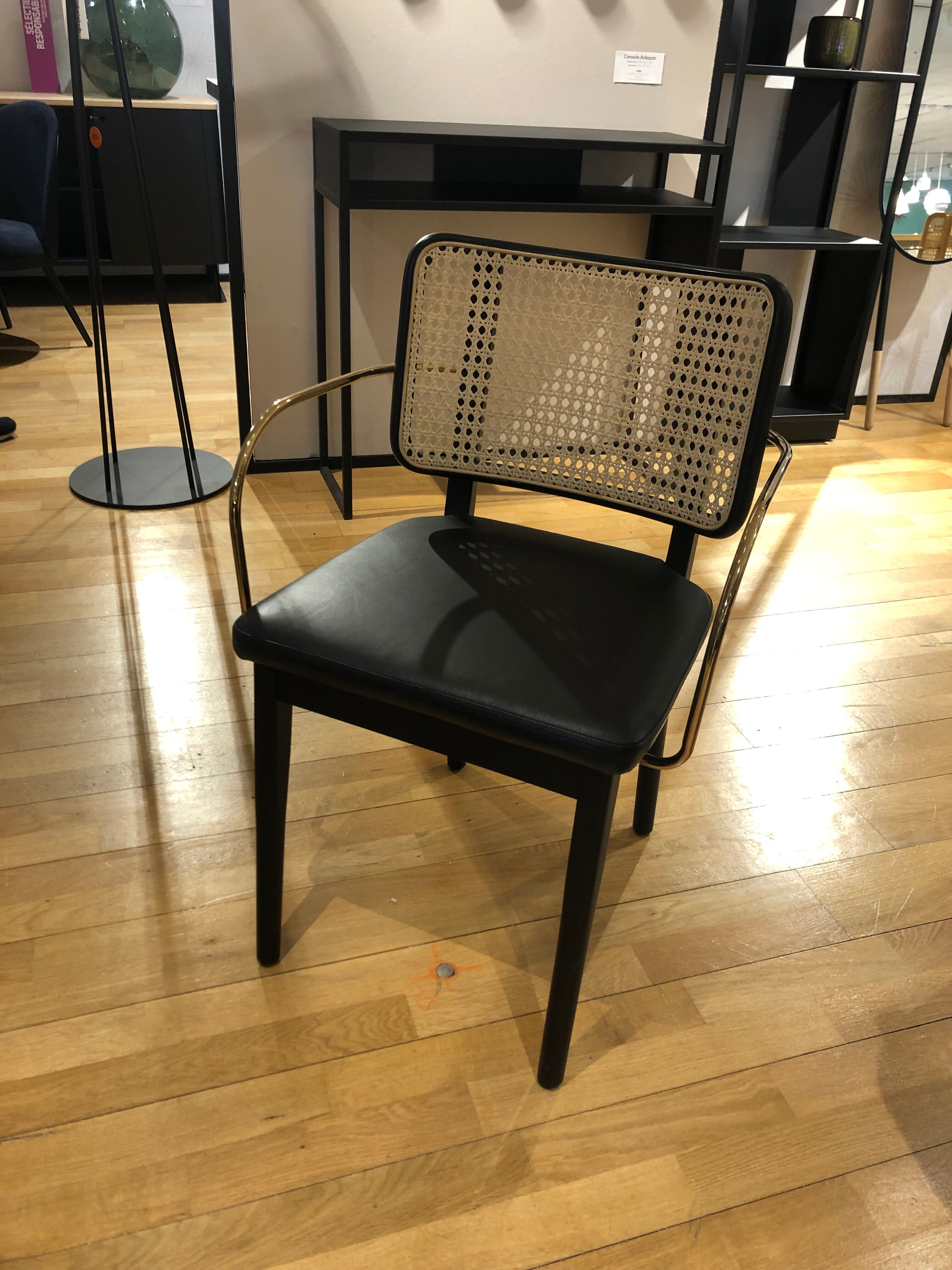 Black leather black wooden cannage chair with armrests