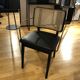 Black leather black wooden cannage chair with armrests