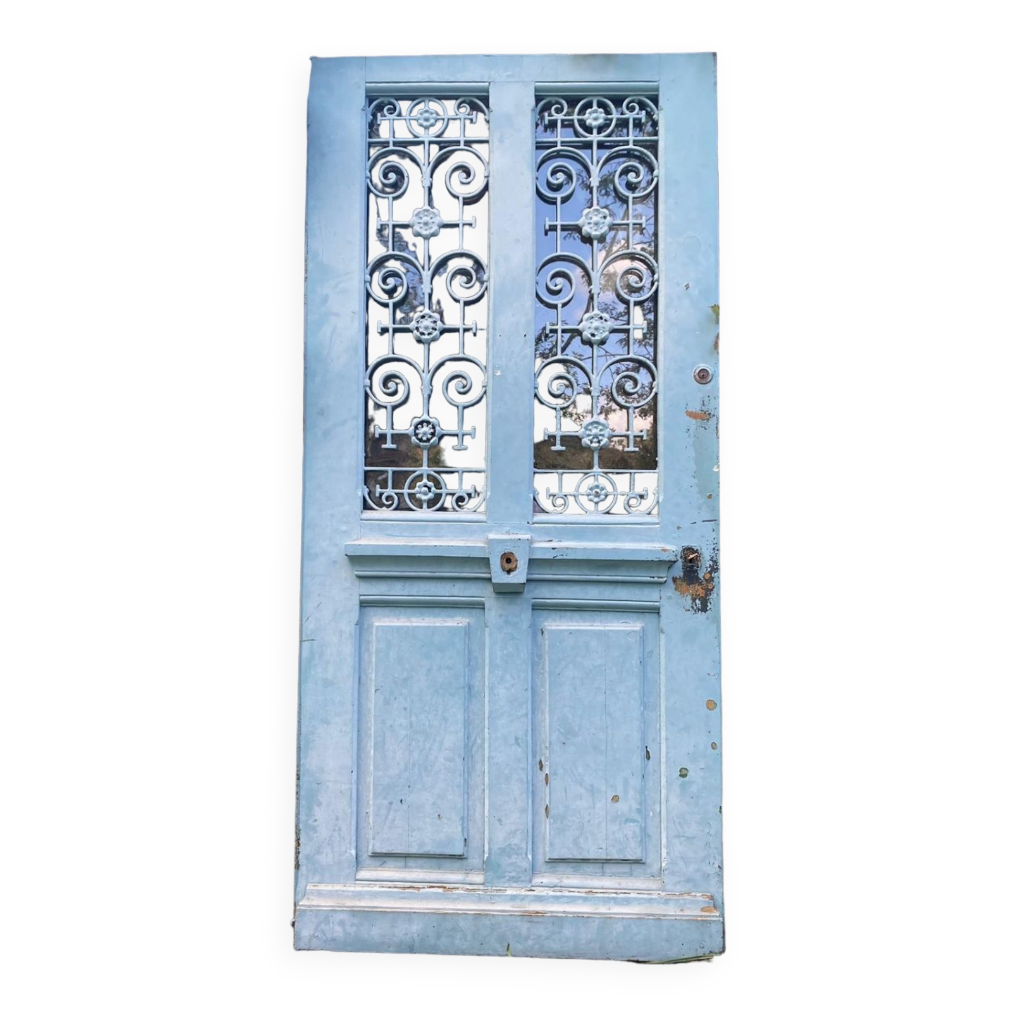 Entrance door in solid oak, cast iron grille, 1930s