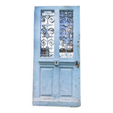 Entrance door in solid oak, cast iron grille, 1930s
