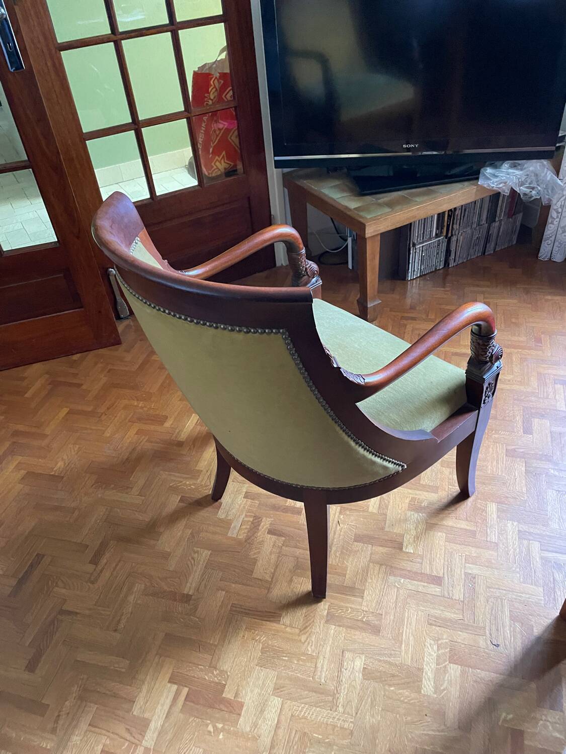 Fauteuil Empire en velours vert et acajou