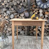 Renovated wooden farmhouse table