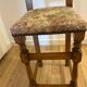 Antique chair with upholstered fabric seat
