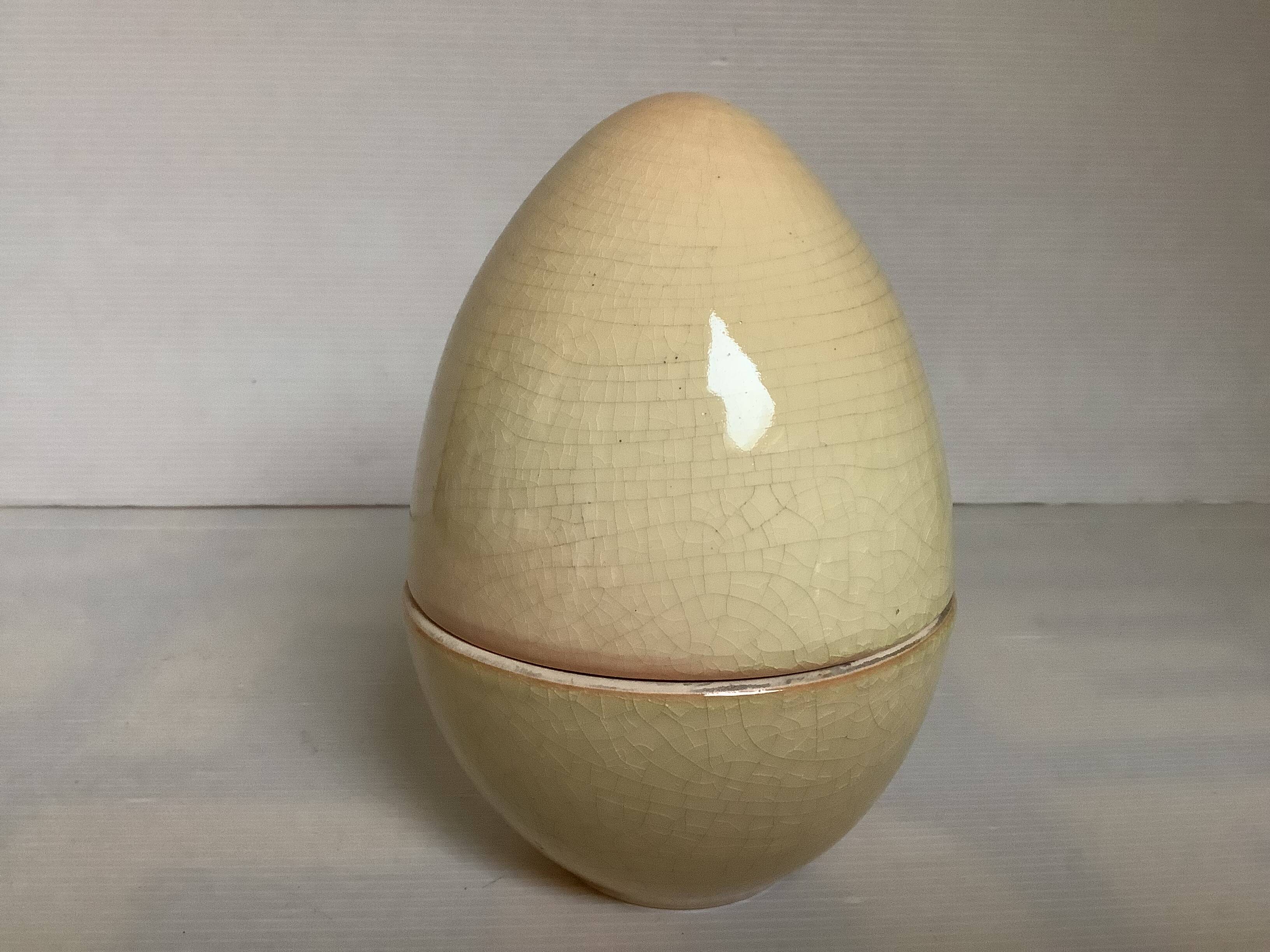 Candy box in the shape of an egg cracked ceramic
