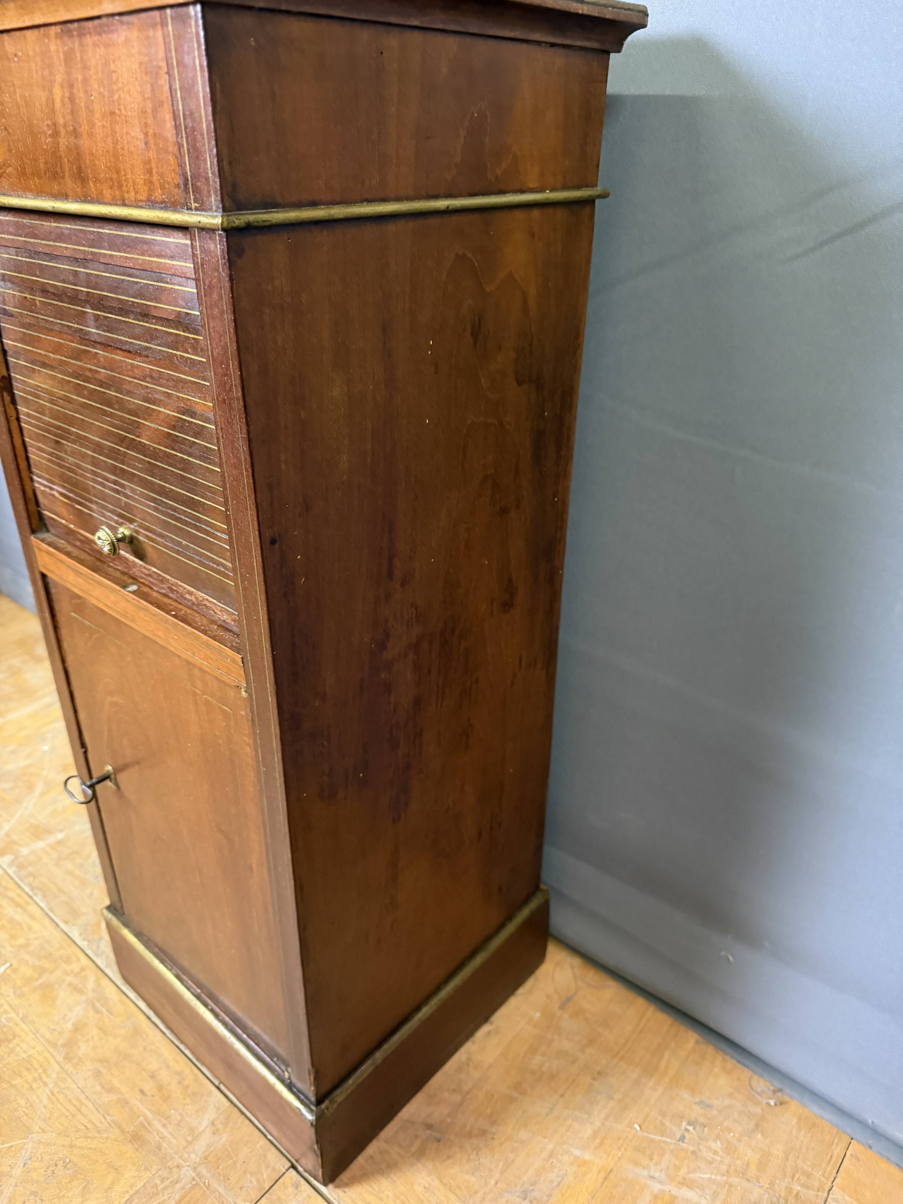 Directoire bedside table in mahogany and brass