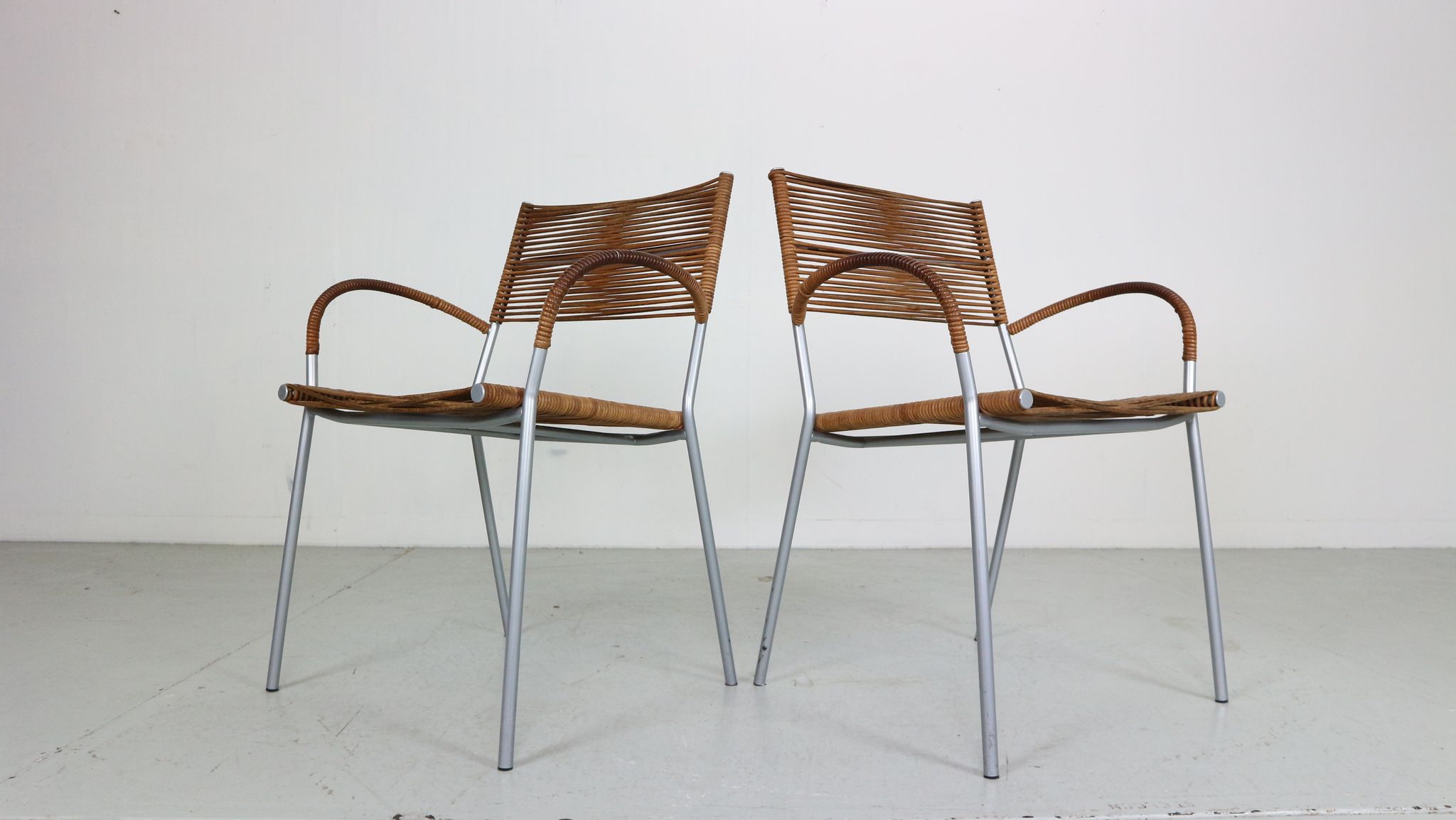 Set of 2 leather Mis B2 RVS armchairs by Tito Agnoli  for Pierantonio Bonacina