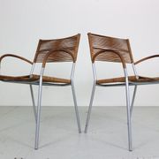 Set of 2 leather Mis B2 RVS armchairs by Tito Agnoli  for Pierantonio Bonacina