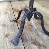 Brutalized wrought iron candle holder