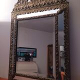 Repelled brass pareclose mirror