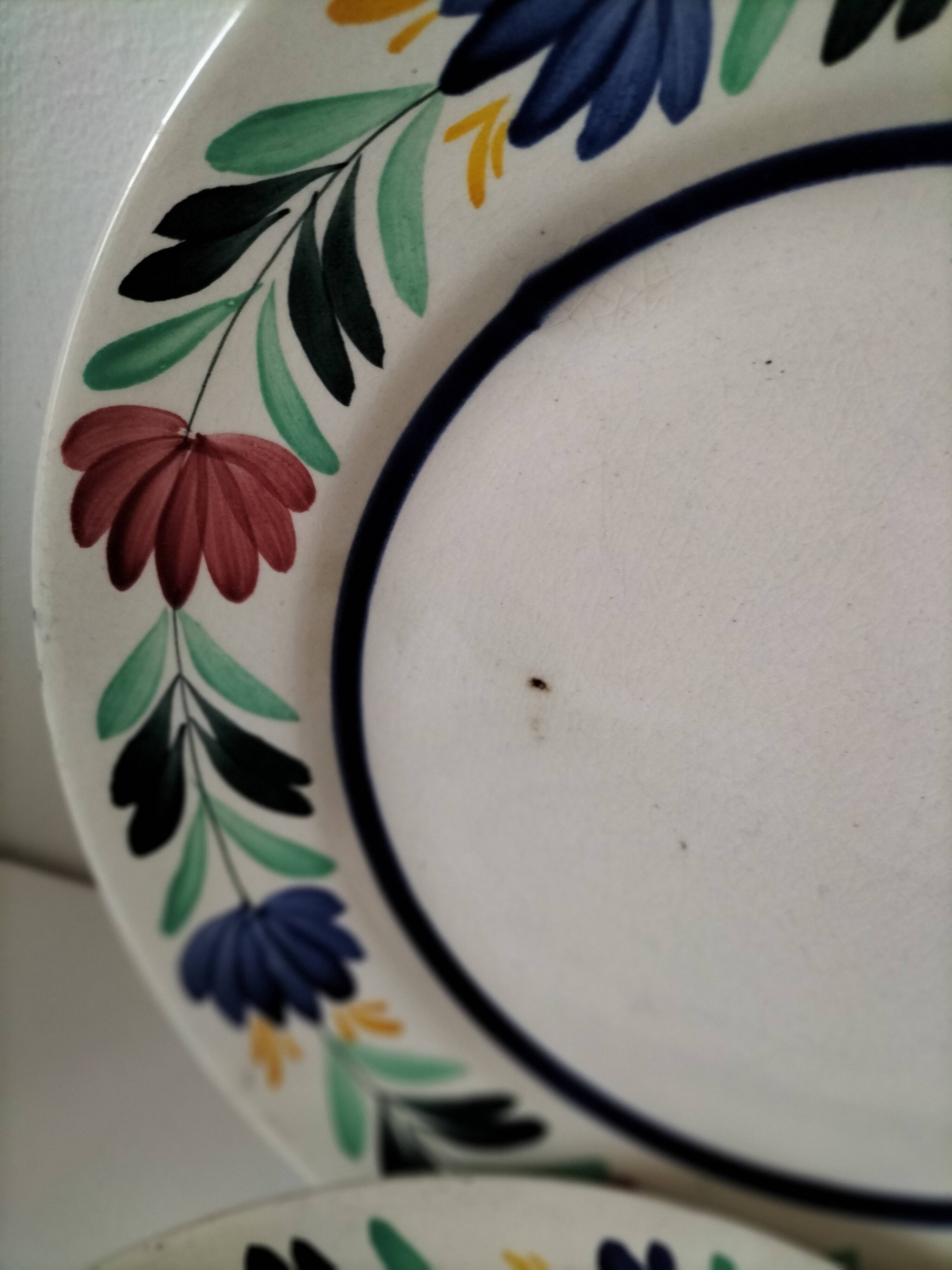 4 Longchamp plates with stylised floral decoration from the 1930s-50s.