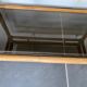 Vintage 1950s rattan and glass TV storage unit.