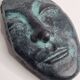 Patinated plaster replica of an ancient Greek face, signed