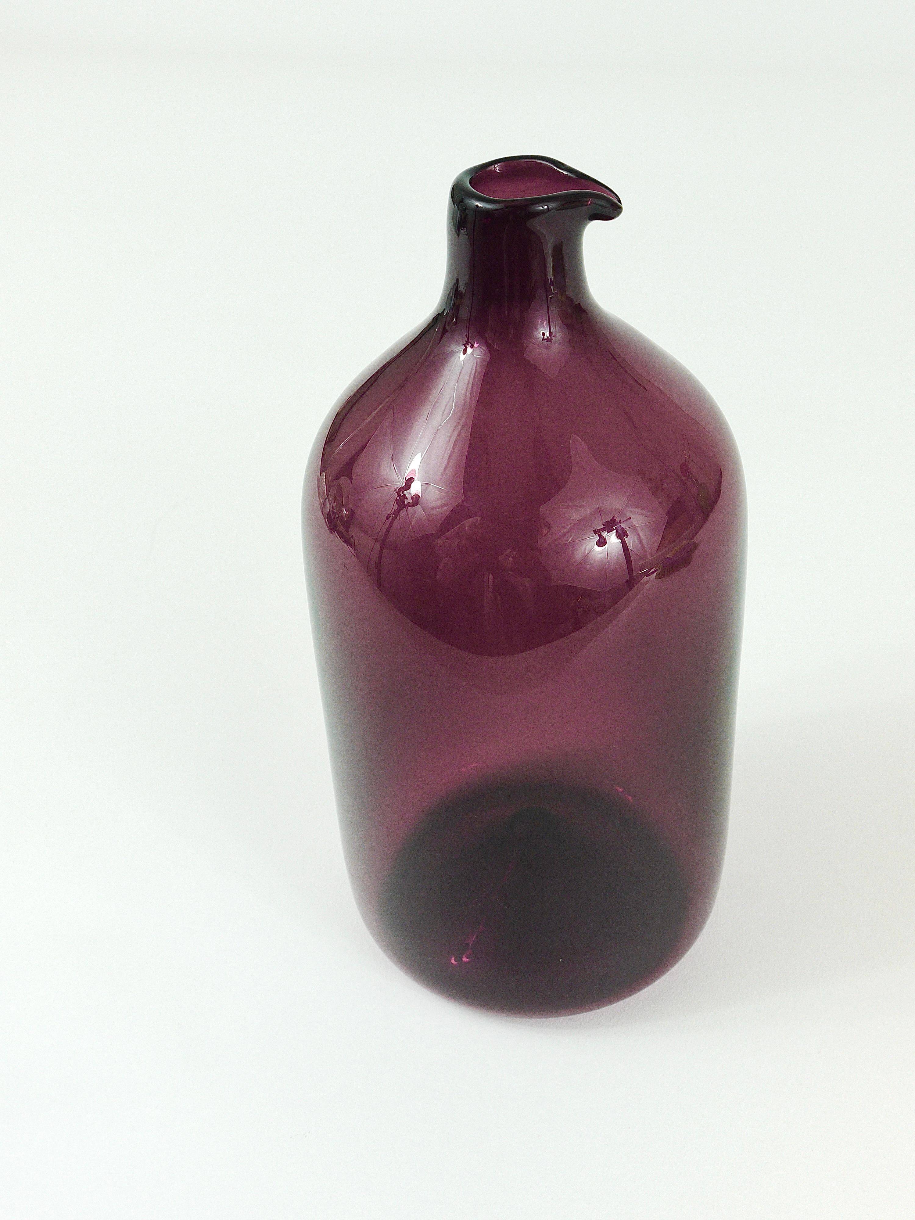 Glass vase signed Purple Timo Sarpaneva Pullo Bird Bottle, Iittala, Finland.