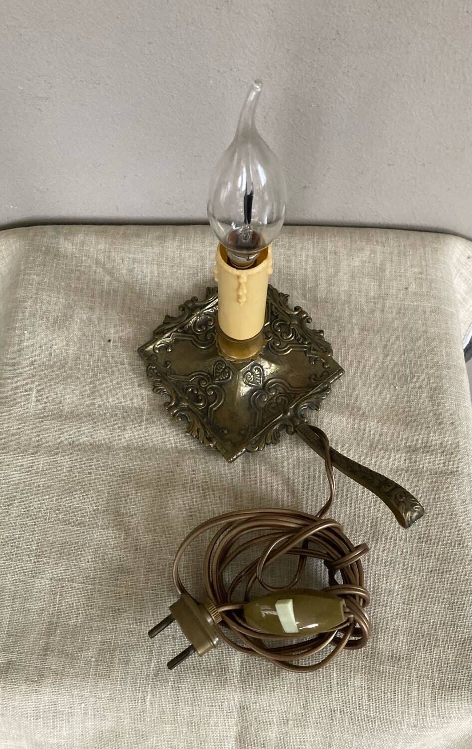 Candle holder with 20th century spelter socket mounted as a flame bulb lamp