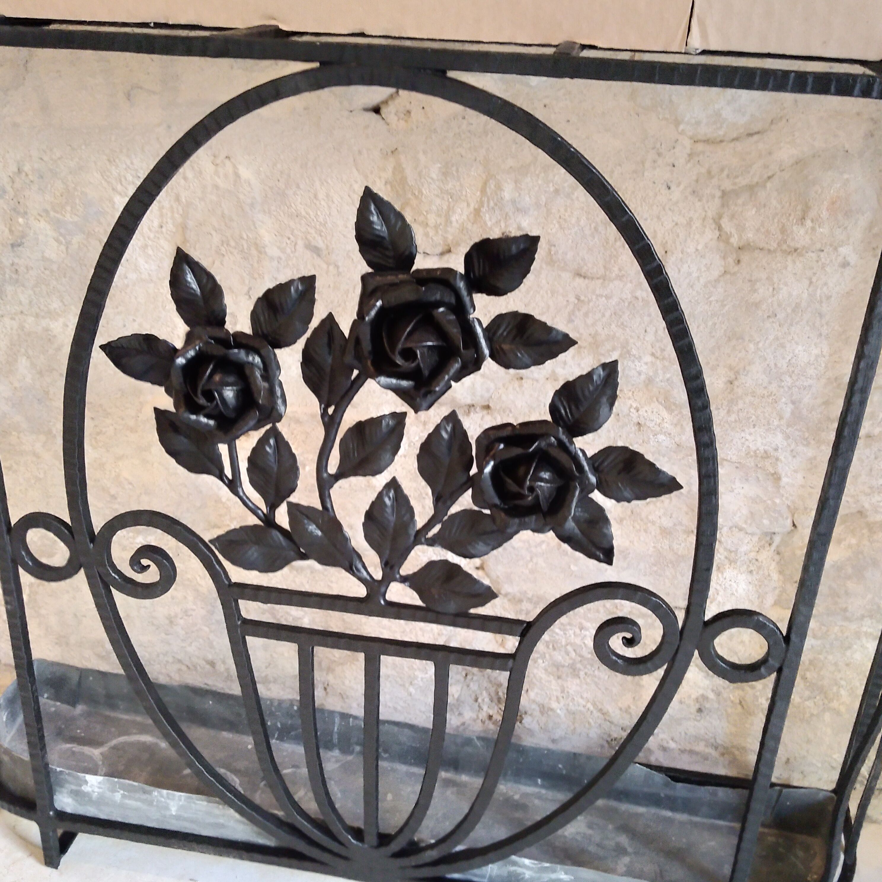 Art deco wrought iron coat holder