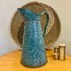 Broc ancien émaillé bleu turquoise et blanc