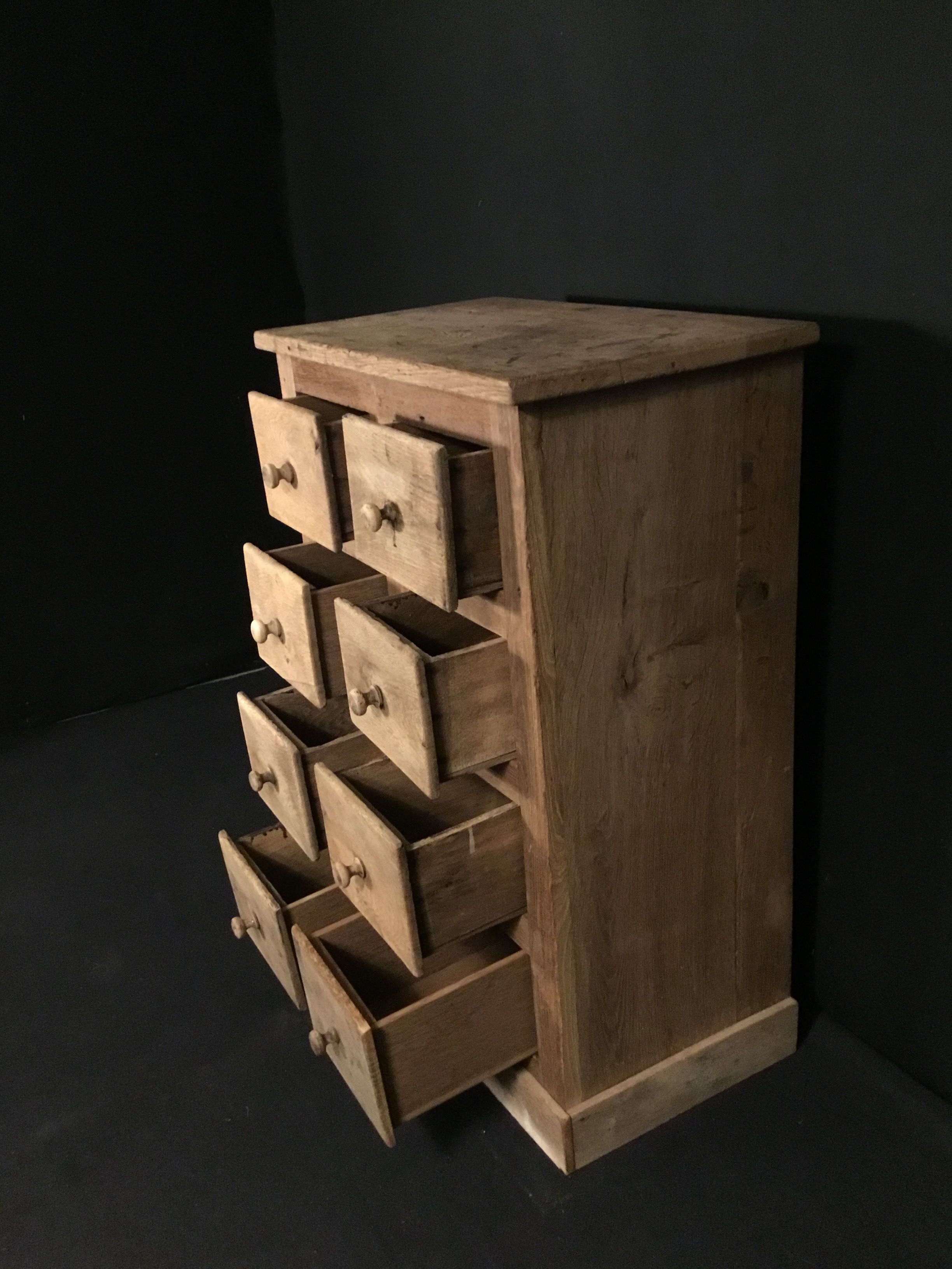 Furniture with 8 drawers in natural oak