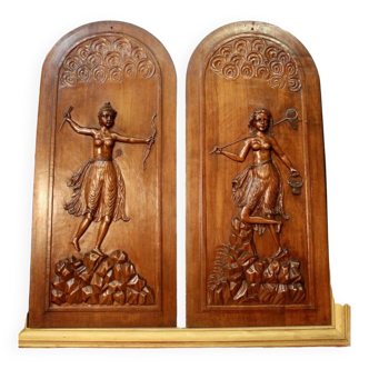 Pair Of Walnut Panels "Bow And Butterfly Hunters"