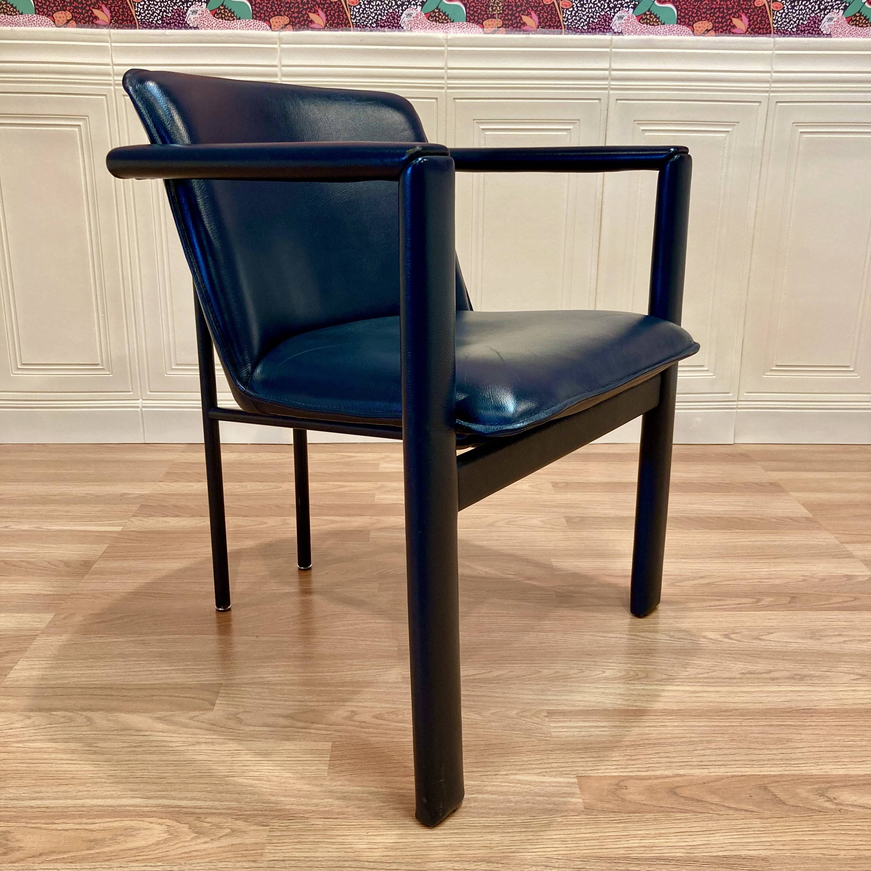 Set of 3 leather and metal armchairs.