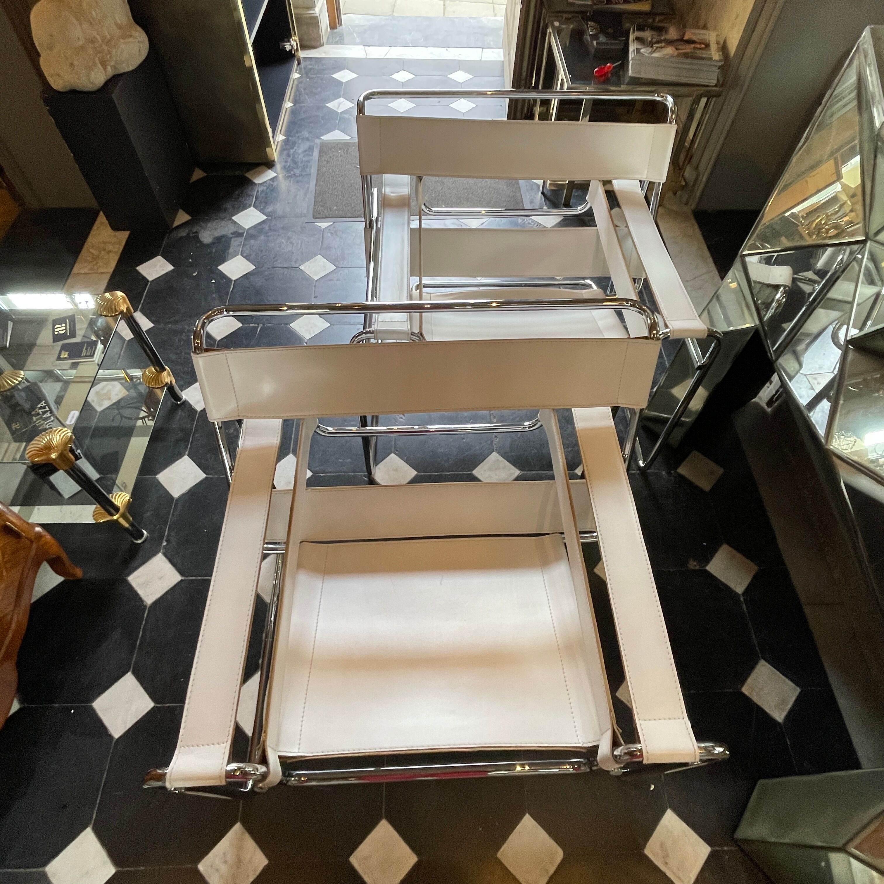 Pair of leather and steel armchairs by marcel breuer for gavina, " wassily b3 "