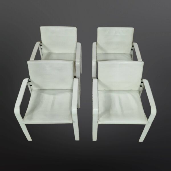 Ensemble de 4 chaises de salle à manger en cuir de Jacques Toussaint et Patrizia Angeloni pour Matteo Grassi. Italie 1