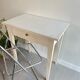 Old small table with a white patina / desk