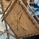 Entrance hall wardrobe in bamboo and rattan from the early 20th century.