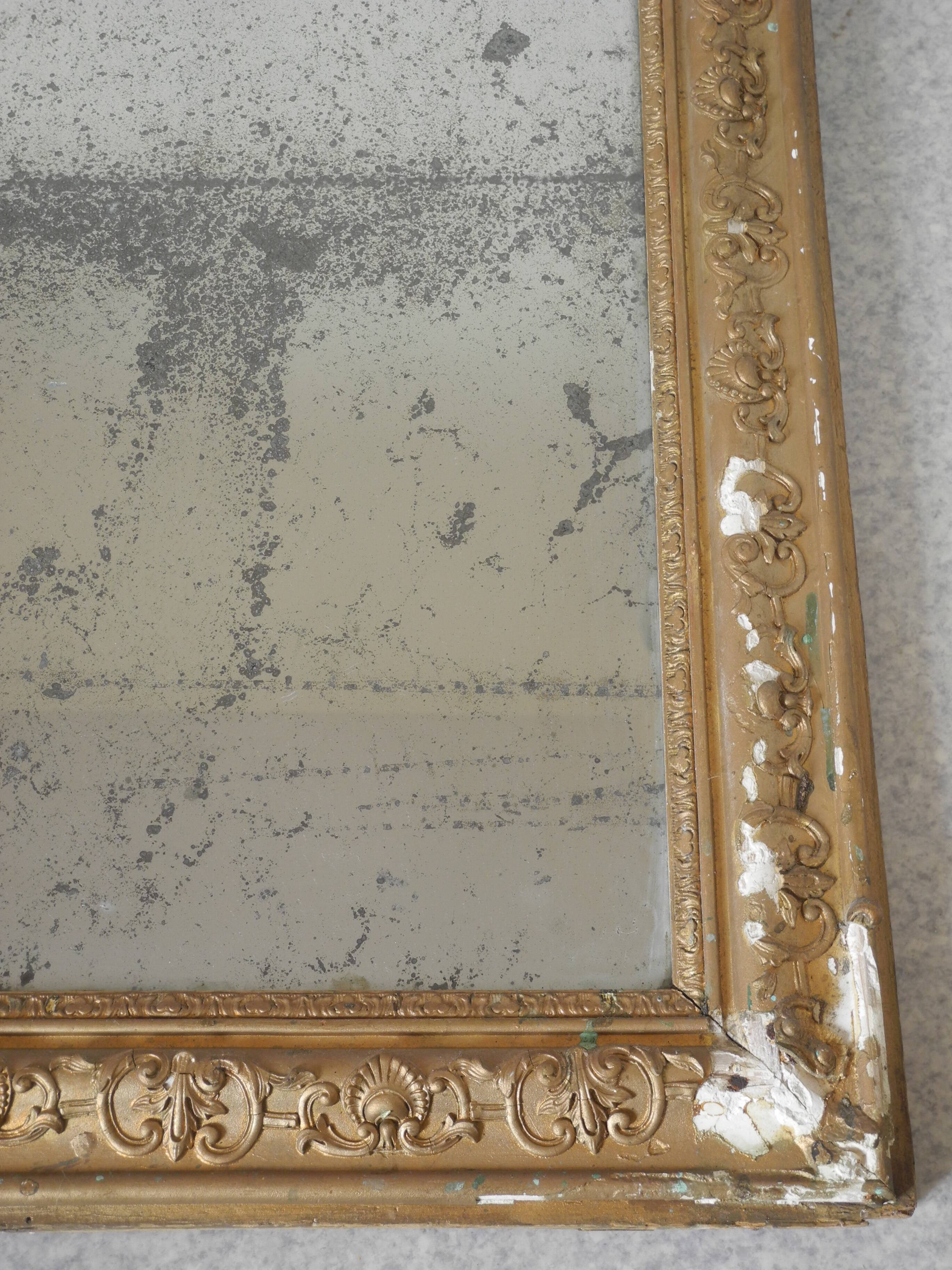 antique mercury mirror with gilded wood and stucco from the 19th century