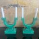 Set of 2 Art Deco candlesticks in green earthenware