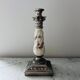 Silver-plated metal and porcelain candlestick