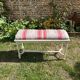 Louis XVI style bench at the end of the bed