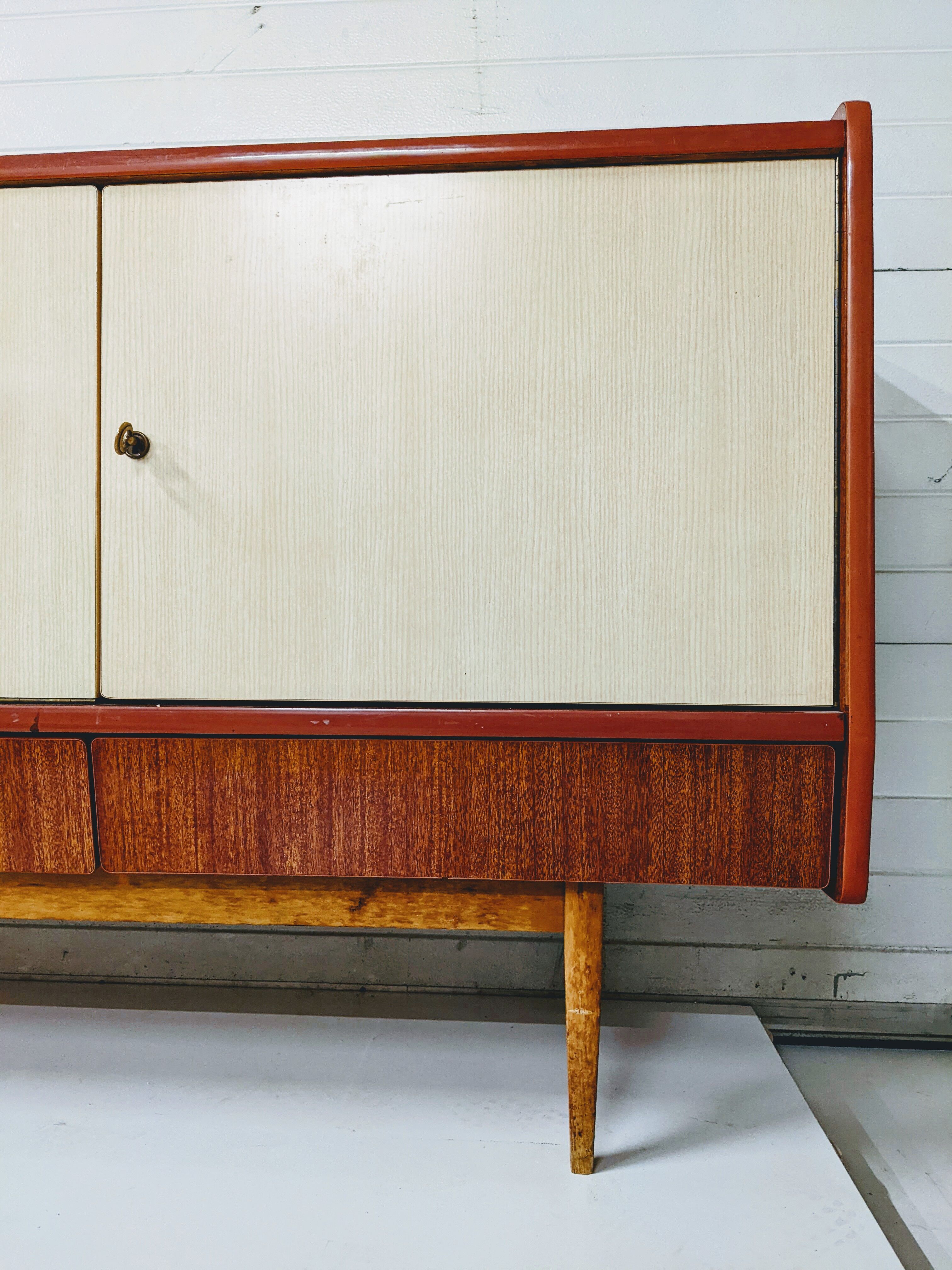 Vintage row in lacquered wood and formica