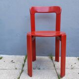 Set of 10 red wooden chairs by Bruno Rey for Kusch&Co