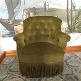 Old chair padded green velvet
