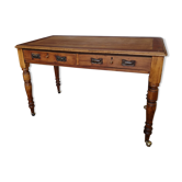 Bureau en bois massif sur roulettes