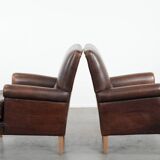 Set of two characterful sheepskin armchairs with a beautiful deep colour