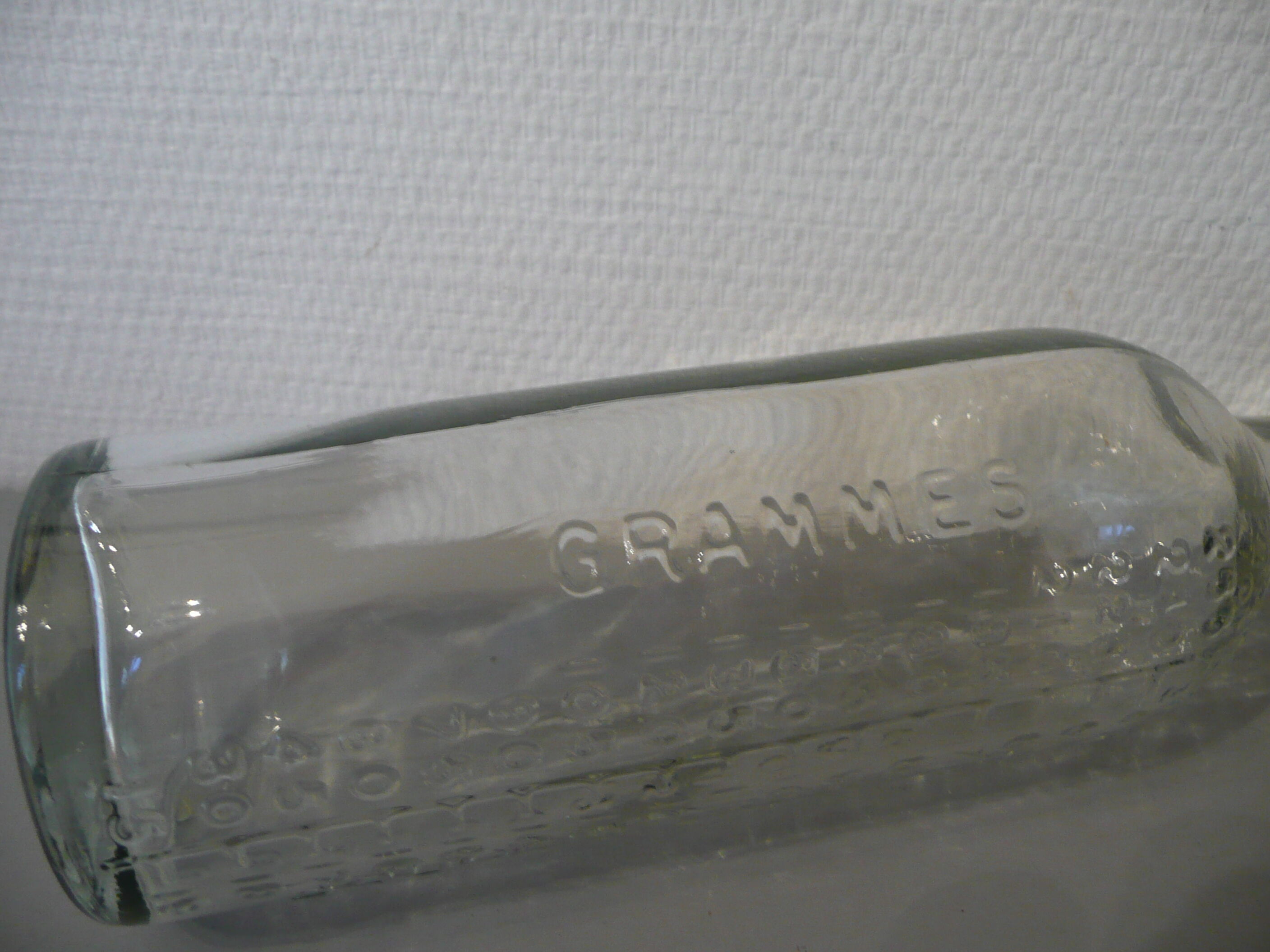 Graduated pharmaceutical bottles