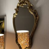 Old baroque style wall mirror with golden moldings
